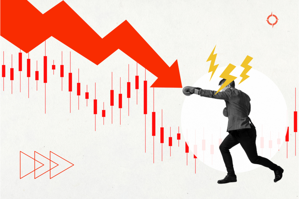 A boxer in a business suit punches a downward trend line.